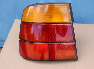 GENUINE ORIGINAL BMW E34 SEDAN SALOON REAR SIDE PANEL TAIL LIGHT LEFT HELLA OEM - Picture 1 of 12