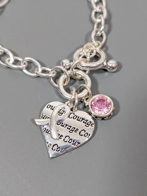 Brazalete de cadena tono plata con dije de conciencia de diamantes de imitación rosa coraje de 7 pulgadas Foto 1 de 4