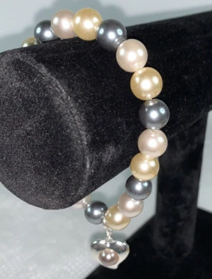 Pulsera elástica nacarada dulce Avon dije de corazón 2011 nueva en caja joyería de moda Foto 1 de 4