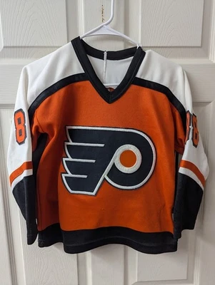 Camiseta deportiva de hockey Philadelphia Flyers Eric Lindros #88 naranja CCM NHL niño niño talla M Foto 1 de 4