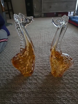 VIDRIO SOPLADO 9 3/4" Y 10" - JUEGO DE ESCULTURA DE JIRAFA CRISTALINO - ÁMBAR Y BLANCO  Foto 1 de 4