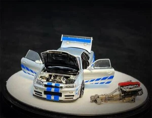 Coche modelo diecast PGM x Onemodel 1:64 GTR R34 Z-TUNE plateado azul - Imagen 1 de 8