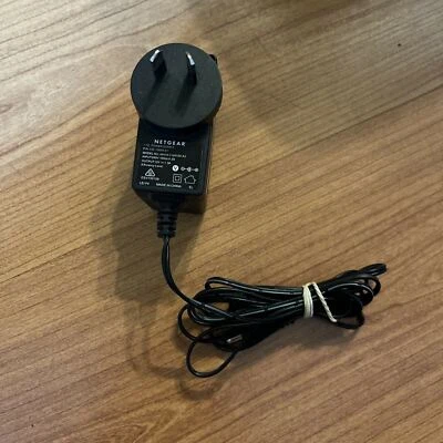 Genuine Netgear MH18-7120150-A3 Ac Adaptor 12V 1.5a - Image 1 of 4