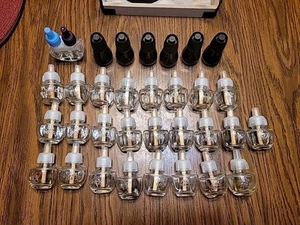 25 leere Airwick Steckglasflaschen, mit Deckel plus 7 extra leere Flaschen - Bild 1 von 2