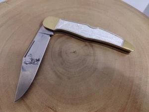 THE SPORTSMAN'S YEAR HUNTING AND FISHING THE WHITETAIL DEER FOLDING KNIFE Silver - Picture 1 of 9