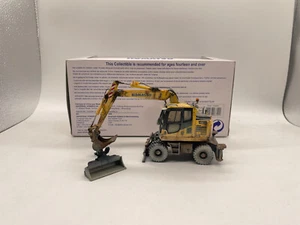 Komatsu PW148-10 Mobilbagger Muddy Version Maßstab 1:50 DieCast Modell UH8083 - Bild 1 von 9
