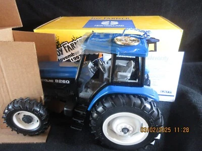 1/16 New Holland 8260 Tractor 1997 Toy Farmer Show Edition Cert. of Auth. Medal - Image 1 of 4