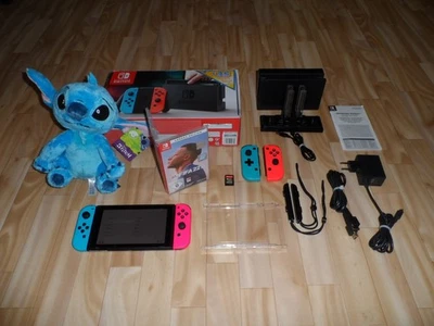 Nintendo Switch Konsole Neon Rot Neon Blau in OVP + Controller + 2x Spiele #2 - Bild 1 von 4