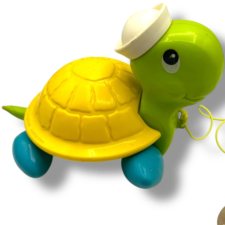 Sombrero de marinero Fisher Price vintage años 70 etiqueta tortuga tirar juguete retro Foto 1 de 4