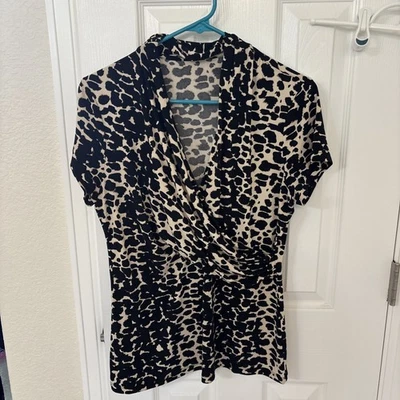 Blusa para mujer con estampado de animales cuello en V manga corta grande Foto 1 de 4