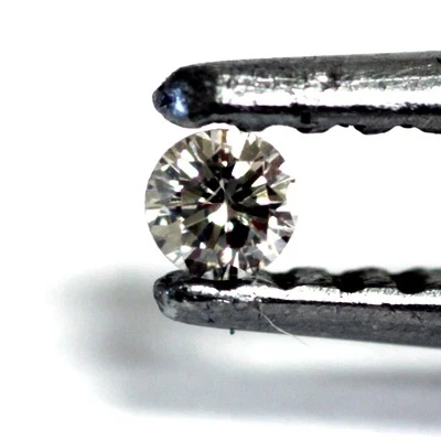 loose individual round natural diamond melee 1.9mm 2mm SI3 brown .02ct .03ct - Image 1 of 4