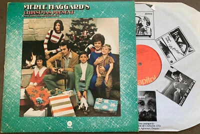 Merle Haggard's Christmas Present - 1979 Capitol Canada LP open shrink ST-11230 - Image 1 of 2