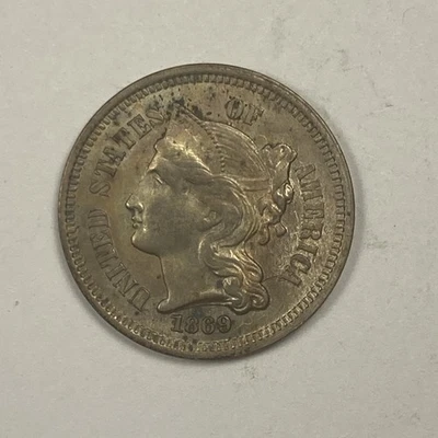 1869 Three Cent Nickel .03. Toned Unc. Spots. - Image 1 of 3