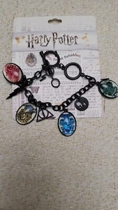 Unique Harry Potter TM&WBEI Black Metal 8.25-9.5" House Charm Bracelet New - Picture 1 of 7