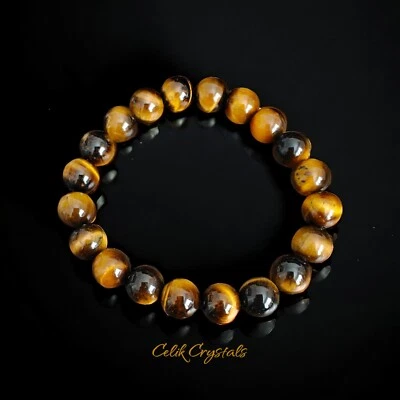 Pulsera de oro AAA ojo de tigre piedras naturales 10 mm unisex pulsera de cuentas elásticas Foto 1 de 4