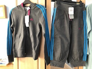grey and blue adidas tracksuit