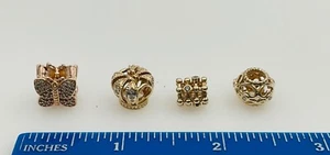 4 ciondoli PANDORA DIAMANTE in oro giallo 14 kt. Prezzo di chiusura 4500€ - Foto 1 di 2