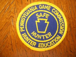 PARCHE PENNSYLVANIA GAME COMMISSION SAFE HUNTER EDUCATION 3" DORADO Y AZUL - Imagen 1 de 1