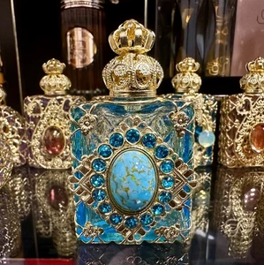 Elegante botella de perfume de aceite de vidrio azul claro con cabujón de vidrio azul - Imagen 1 de 7
