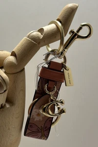 🐼💦 Coach CH856 🐼💦 Butterfly Flower Trigger Snap Bag Charm Key Chain 🐼D109*7 - Picture 1 of 5