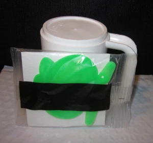 Kellogg's Cereal Toy "Garfield Bike Reflector" Neon Green Vintage 1990 Sealed - Picture 1 of 4