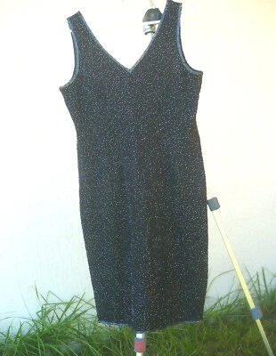 VESTIDO NEGRO SIN MANGAS JMD NEW YORK CON CUENTAS M L FUNDA RELOJ DE ARENA Foto 1 de 4