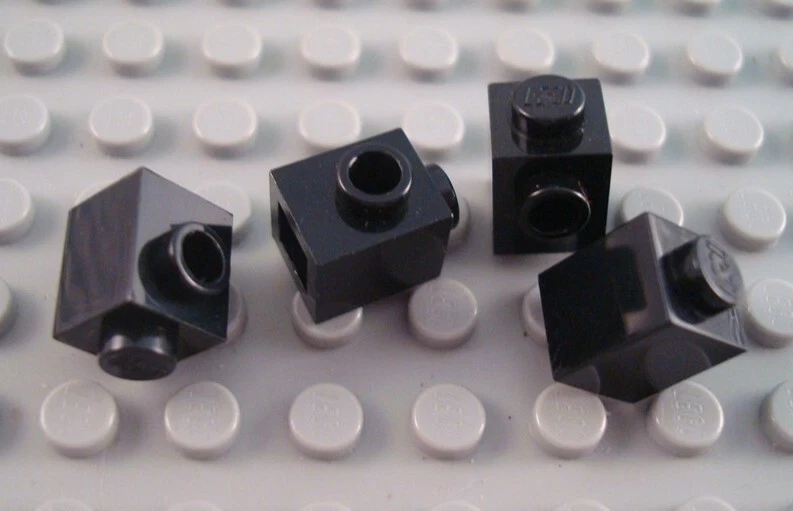 LEGO Lot of 4 Black 1x1 Bricks with 1 Side Stud - Image 1 of 1