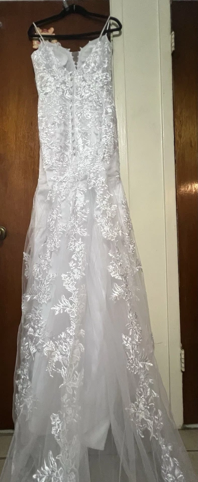 White Lace Wedding Dress with Spaghetti Straps and Floral Embroidery - Image 1 of 4