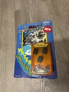 1988 The Real Ghostbusters Water Challenge SEE PICS COMING OFF CARD RARE Bin 10 - Picture 1 of 2