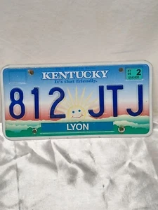Kentucky Sunburst License Plate Happy Smile Sun Lyon County  exp.2006 - Picture 1 of 2