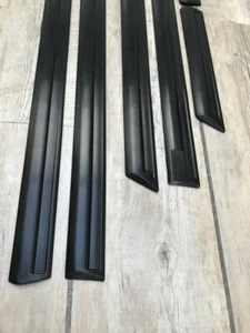 SAPPHIRE COSWORTH SIDE MOULDINGS Door etc - Picture 1 of 4
