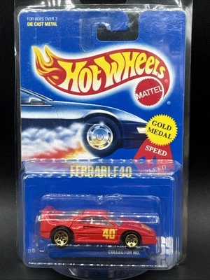 1990 Hot Wheels BLUE CARD #69 RED FERRARI F40 GOLD 5 SPOKES Gold Medal Speed - Image 1 of 4