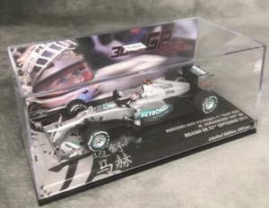 Minichamps F1 1:43 M Schumacher Mercedes AMG W03 300th GP Belgian GP 2012 - Picture 1 of 5