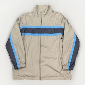 Chaqueta cortavientos vintage Nike Athletics etiqueta plateada mediana deletreada gris azul - Imagen 1 de 5