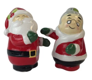 Weihnachten Salz & Pfefferstreuer Mr & Mrs Santa Umarmung 3" hoch New Old Stock - Bild 1 von 7