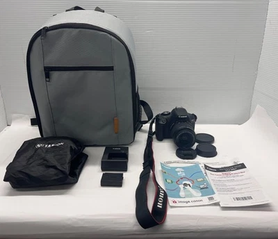 Cámara réflex digital Canon EOS Rebel T7 con lente de 18-55 mm y mochila para cámara gris Tarion Foto 1 de 4