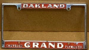 RARE CHRYSLER, PLYMOUTH,“ GRAND “ ( OAKLAND CA..) LICENSE PLATE FRAME VINTAGE - Picture 1 of 8