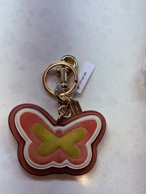 Dije de bolso Coach Butterfly en lona Sig; llavero dividido y clip para correa de perro; nuevo con etiquetas Foto 1 de 3