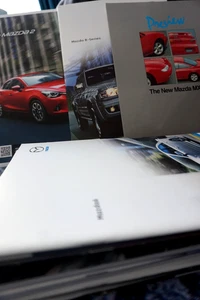 Lotto Lavoro Brochure Vendita Mazda - 21 Articoli - 323, 626, 3, 5, CX-7, 6. - Foto 1 di 5