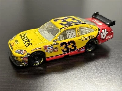 HTF, LOOSE, 2010 Clint Bowyer #33 Cheerios: COT, 1/64 scale NASCAR Diecast - Image 1 of 4