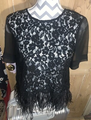 Top de encaje negro manga transparente pluma de avestruz ribete cremallera Topshop Boutique 10 Nuevo sin etiquetas Foto 1 de 4