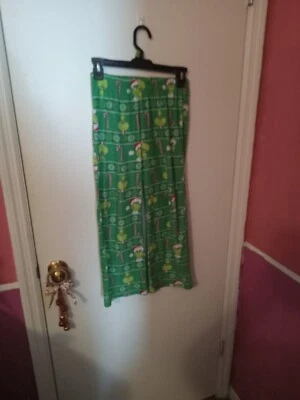 Pantalones de pijama de vellón de Navidad Grinch para niños y niñas Foto 1 de 4