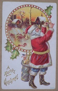CARTOLINA PRIMI '900 IN RILIEVO, BUON NATALE, BABBO NATALE CON SACCHETTO DI GIOCATTOLI - Foto 1 di 2