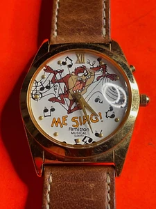 Vintage Armitron Me Sing Taz Gold Tone Analog Quartz Musical Watch - Picture 1 of 2