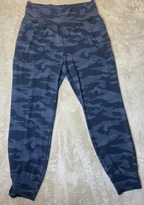 ATHLETA Jogger Mujer Talla M Camuflaje Negro Saludo Crucero - Imagen 1 de 9