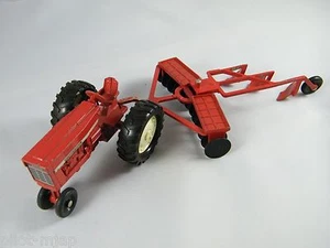 VINTAGE INTERNATIONAL HARVESTER TOY TRACTOR WITH ERTL PLOW - Picture 1 of 9
