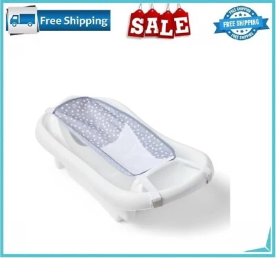 The First Years Sure Comfort Deluxe bañera de recién nacido a niño pequeño con cabestrillo Foto 1 de 4