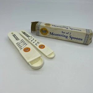 Juego de 2 cucharas medidoras ajustables blancas medalla dorada de colección en caja - T/15 ml, t/5 ml - Imagen 1 de 7