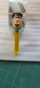 PEZ Flintstones Fred Flintstone - yellow stem - Loose - china - Picture 1 of 2