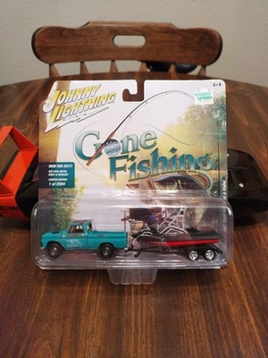 Johnny Lightning Gone Fishing 1965 Chevrolet Truck With Boat & Trailer Version B - Image 1 of 4